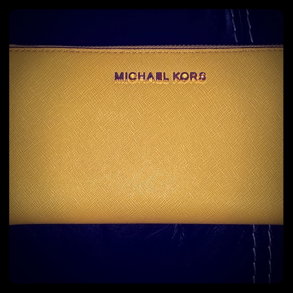 NwT yellow jet set travel clutch